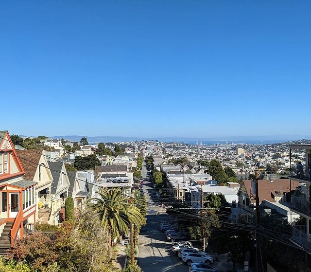 Looking towards the bay from a hill in a San Francisco residential neighborhood
